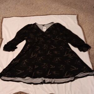 Brand new, size 26, long sleeve dress.